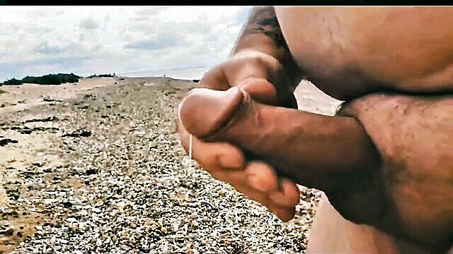 Big dick closeup cumming on beach with fat belly guy handjob