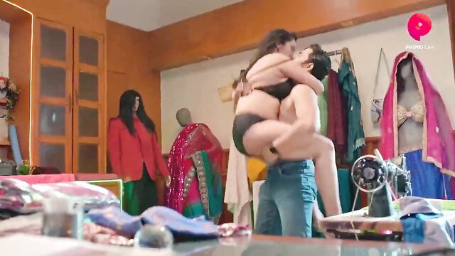 Indian couple tailor shop sex, man lifts busty desi beauty mid-fuck