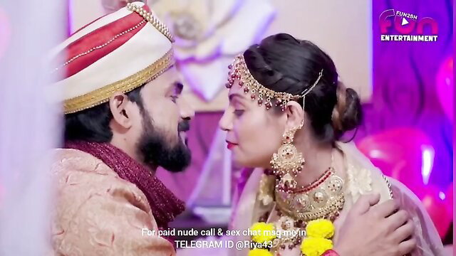 Indian bride and groom in traditional wedding attire, close romantic gaze