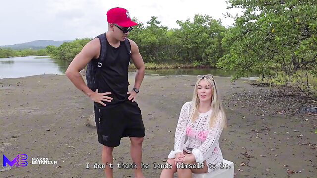 Max Betancur with blonde Tatiana Alvarez on beach, outdoor tease
