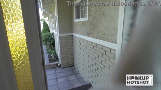 Hime Marie at sunny home door, hot yellow glass & brick porch