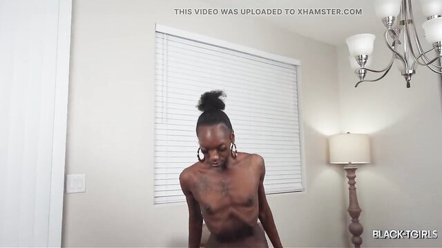 Nude Black TGirl Jenn-Te'anna posing topless in Black TGirls