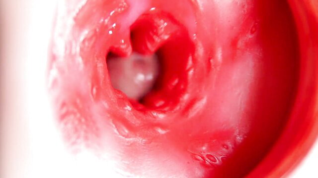 Close-up POV of pulsating wet pussy squeezing cock, camera inside hole