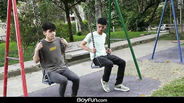 Asian twinks swinging at playground on BoyFun