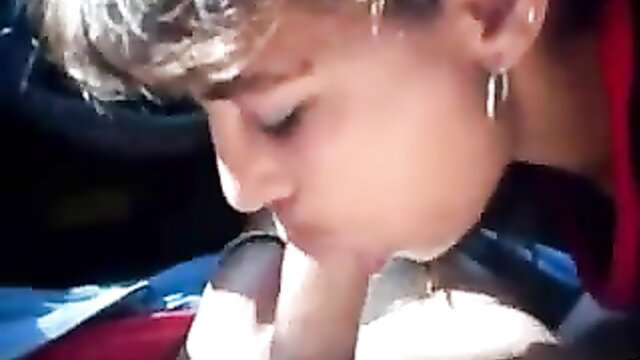 Romanian hooker deepthroats cock in car closeup