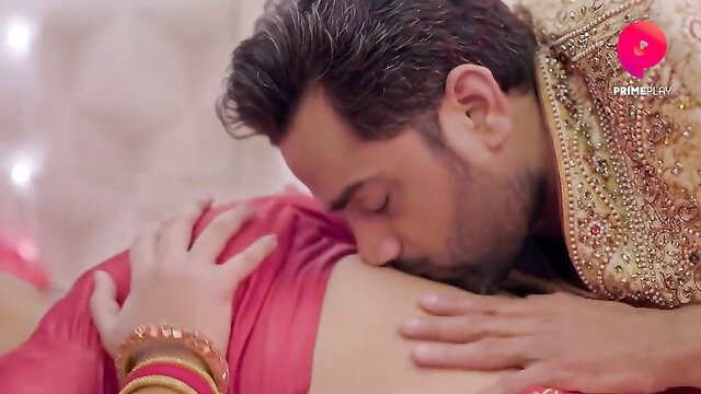 Horny Indian girl in red saree embraces man in erotic closeup kiss