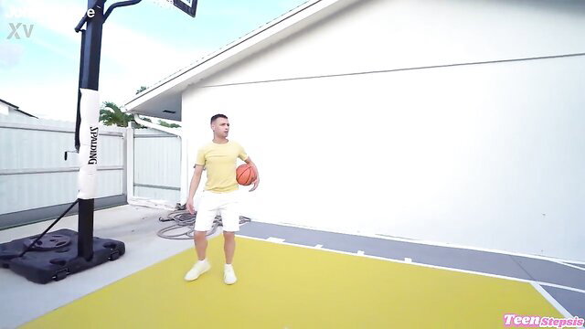 Gemma Boop in yellow tee and shorts with basketball at outdoor hoop