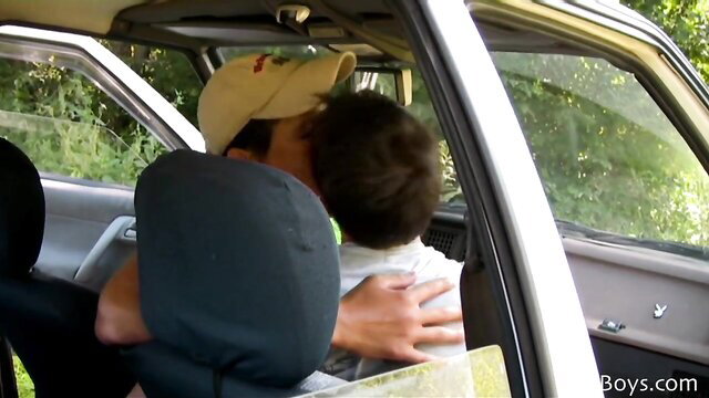 Summer Day kissing boy in car on warm day at Love Trans Sex