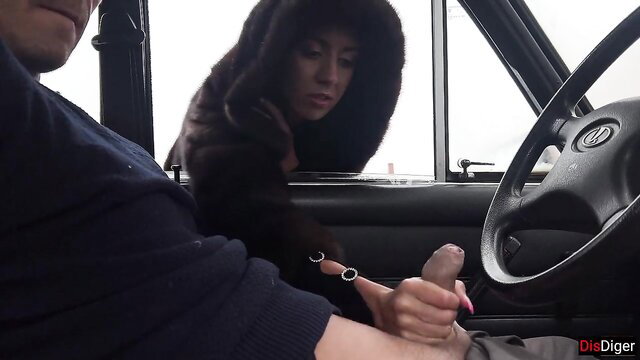 Katty West jerks off stranger's dick through car window in public lot