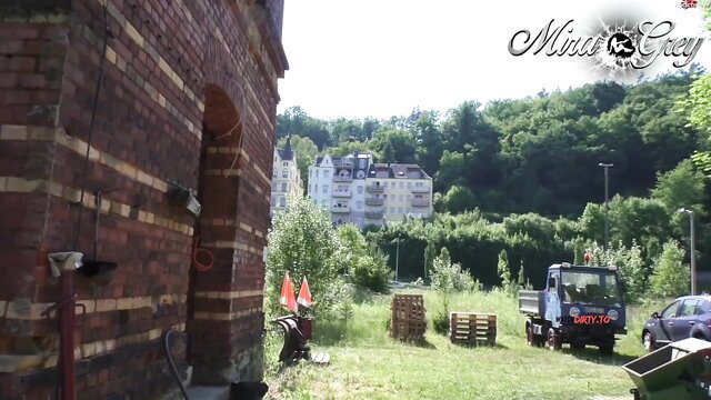 Mira Grey public outdoor scene with truck, construction site view