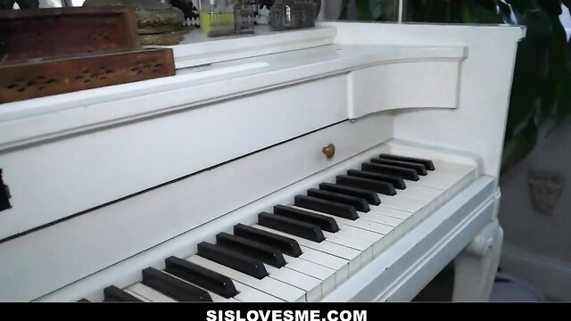 Vivian Taylor at white piano in hot stepsister tease