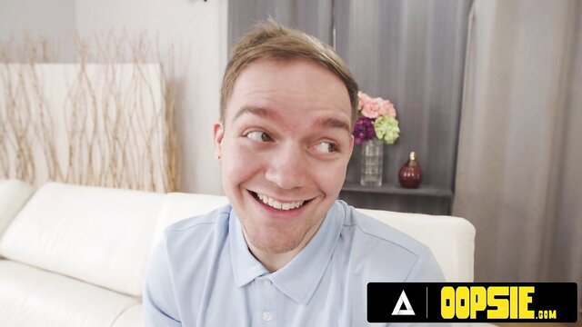 Gogo Fukme grinning playfully in OOPSIE cougar nurse video