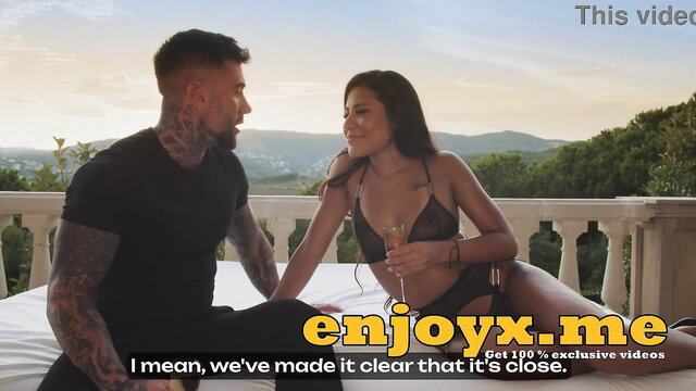 Andrea Retali in sexy lingerie teases tattooed stud at sunset balcony POV