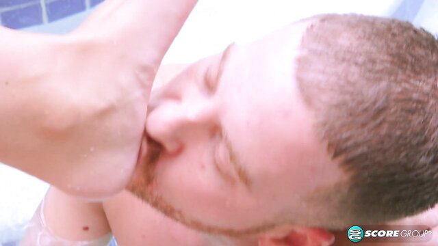 Hot foot domme presses bare sole on man's face in Ped Peeper foot fetish scene