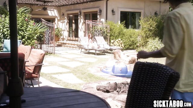 Lexi Luna in backyard lounging by pool, big tits MILF