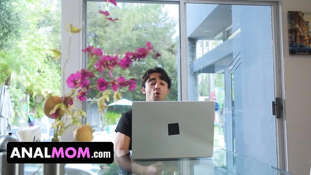 Carlos Dickinson shocked at laptop with analmom.com porn