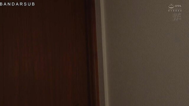 JAV Asian woman in dim room by door, softcore tease
