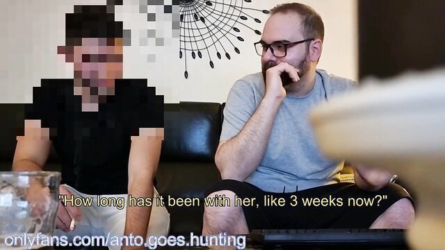 Two shirtless guys chatting playfully on couch in straight curious amateur video