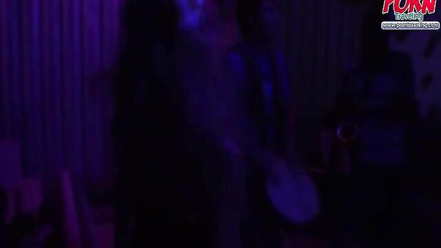 Blurry Thailand amateur porn party with Asian girl holding white object