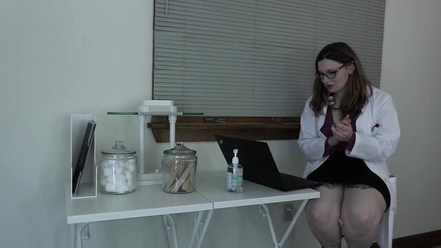 Bettie Bondage as sexy doctor in lab coat, upskirt tease