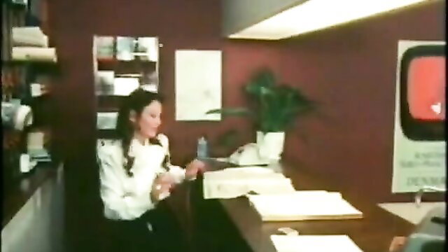 Horny maid in retro office scene from Danish Hardcore 116 Color Climax