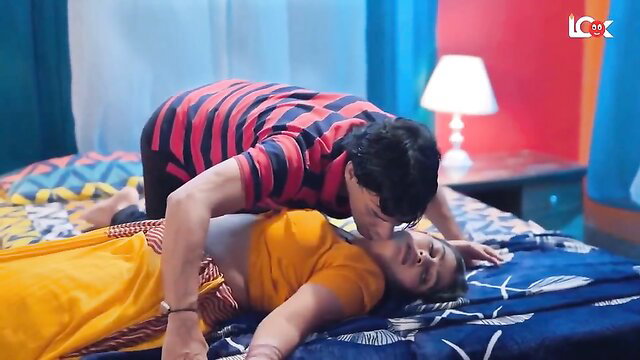 Indian couple in steamy missionary kiss on bed, hot desi sex scene