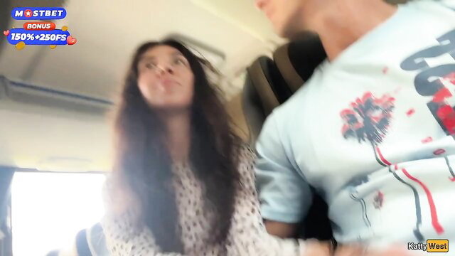 Hot Asian babe gives handjob on public bus in Katie West video