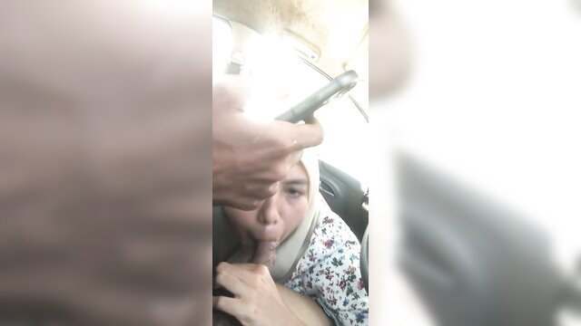 Muslim hijab girl sucking cock in car amateur blowjob