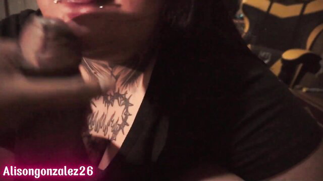 Tattooed alt girl deepthroating thick cock closeup