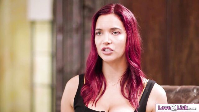 Jezabel Vessir redhead beauty in low-cut black dress, seductive pout