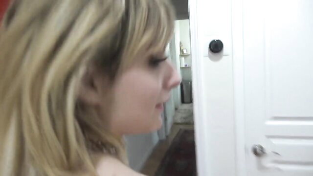 Blonde pornstar Evie Christian closeup profile in GFE session