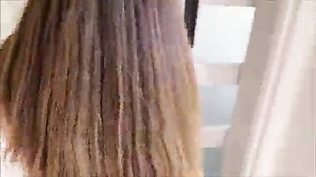 Danielle Renae long wavy blonde hair back view in Florida Getaway