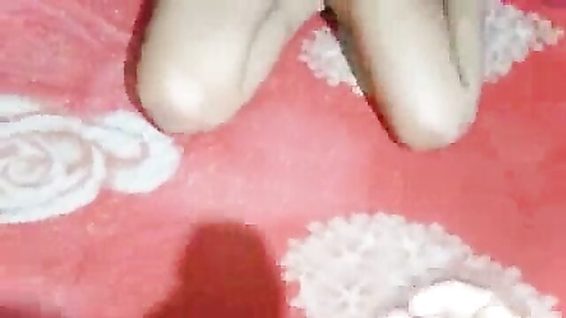 Amateur escort deepthroats cock on red bed while on phone call