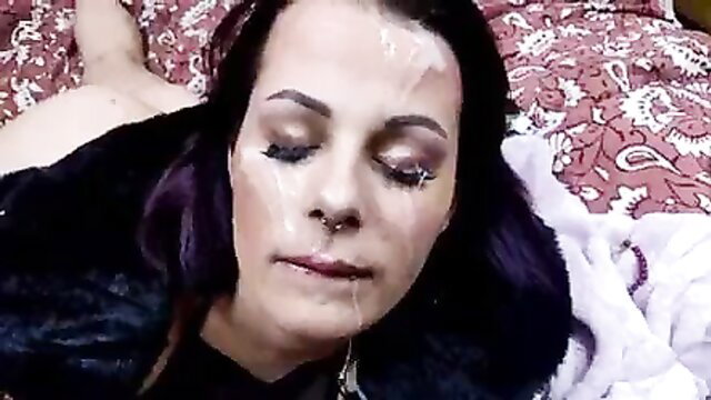 Hot brunette with purple hair covered in huge facial cumshot closeup