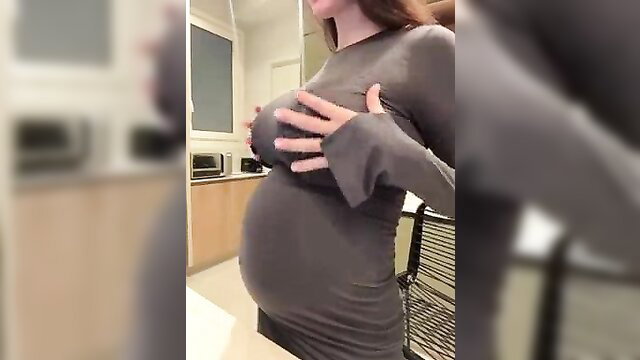 Pregnant Elena Sterni squeezing her big milky tits in tight dress