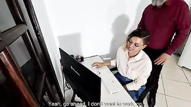 Woman with short hair harassed by boss at desk on first workday