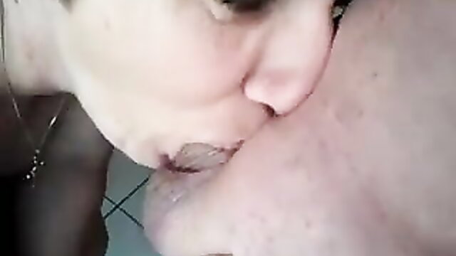 Chunky short-haired brunette housewife eagerly sucks thick cock closeup