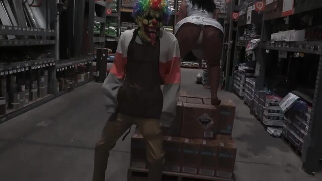 Queen Rogue bent over in clown mask fucked by Gibby at Home Depot