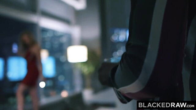 Blonde party babe in red dress teases big black cock from behind