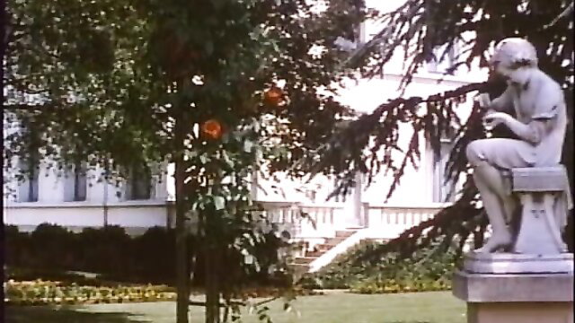 Vintage 1972 Les félines classic: nude statue girl in garden by mansion