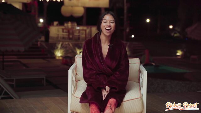 Ameena Green smiling in red robe, Willow Ryder adult video thumbnail