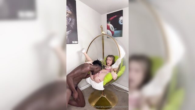 Blonde teen in pink dress fucked by BBC in swing chair