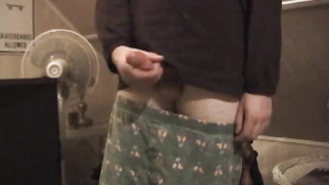 Young Christian in plaid boxers pulls out cock, teasing cum twice