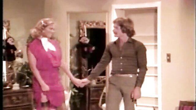 Ashley Wells holds hands with man in Goodbye Judy Swedish Erotica retro porn