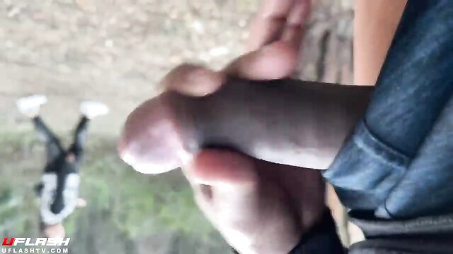 Amateur guy masturbating huge black cock outdoors for watching girl