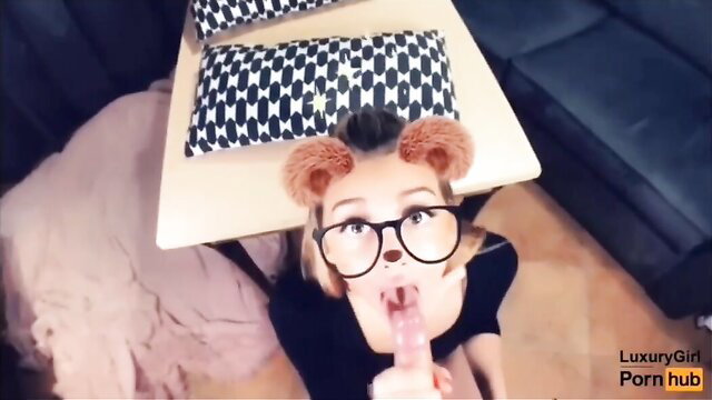 Cute Asian girl with glasses and bear ears sucks dildo closeup