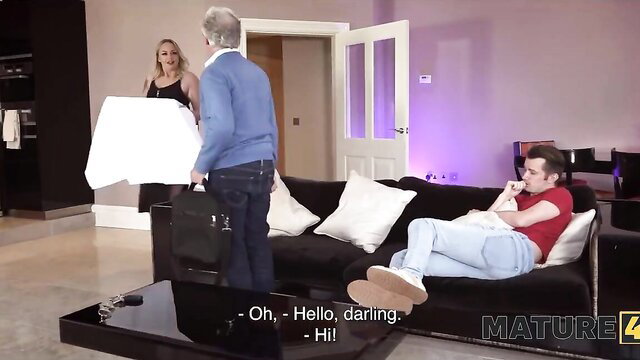 Mature MILF greets young dude on couch in hot 4K blowjob scene