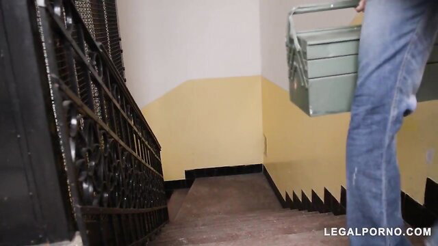 Nekane Sweet carrying toolbox up stairs in tight jeans