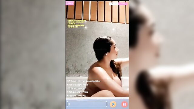 Asian beauty naked in bath, wet brunette side profile solo tease