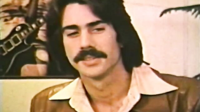 Handsome 70s mustached man in leather jacket, vintage porn thumbnail